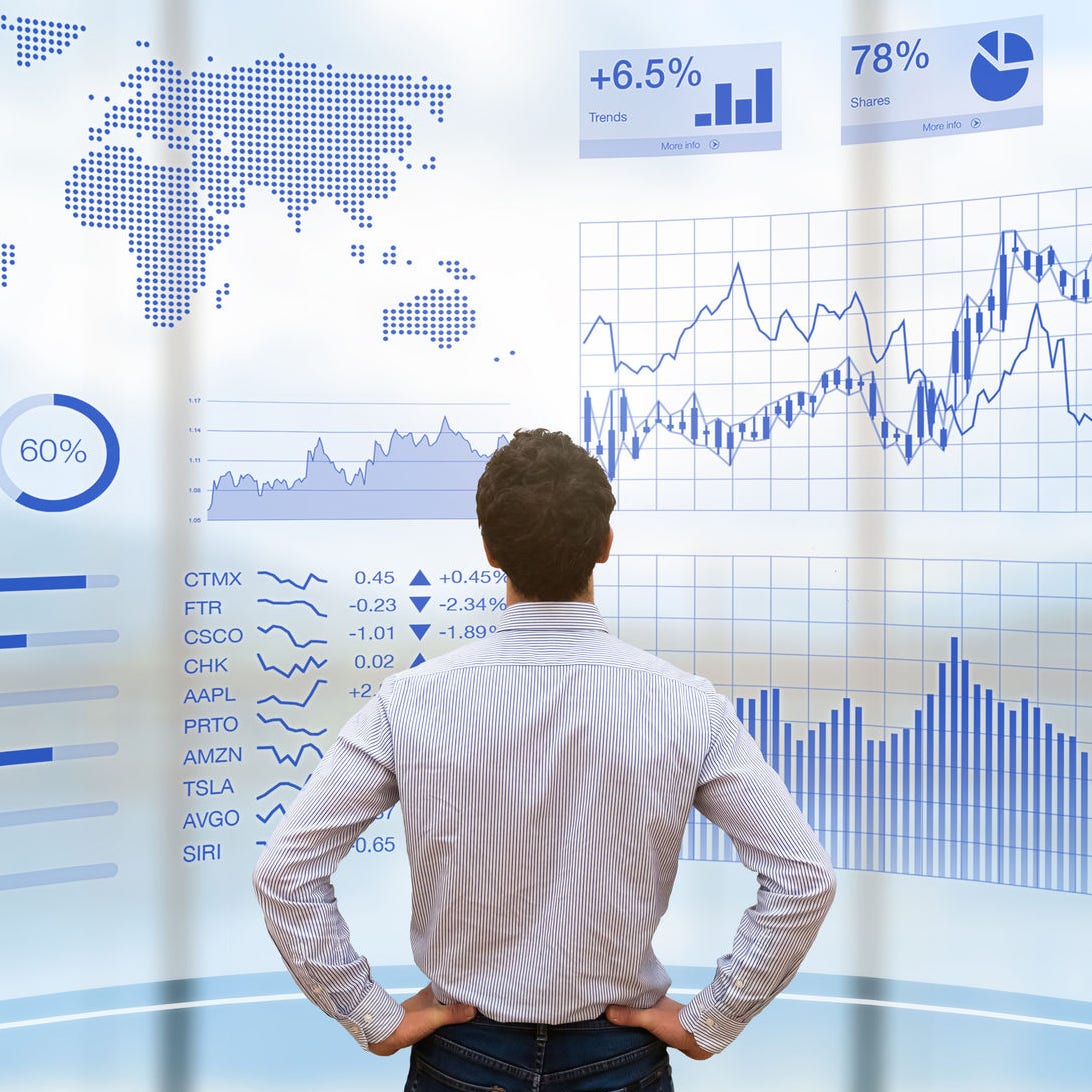 Person using a futuristic head up display (HUD) interface screen with data and key performance indicators (KPI) for business intelligence (BI) analytics, concept about financial dashboard, technology and virtual reality (VR)