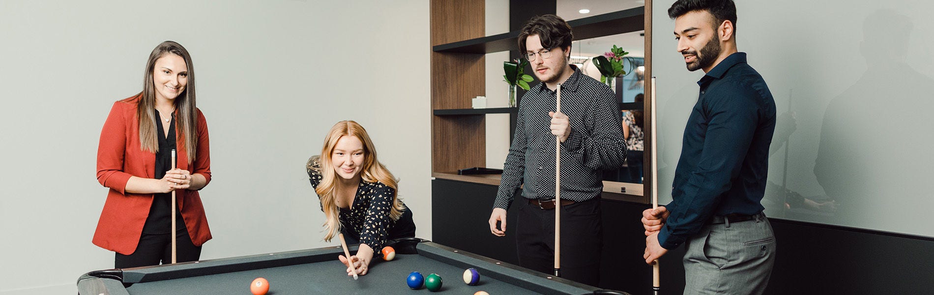 Business people playing pool