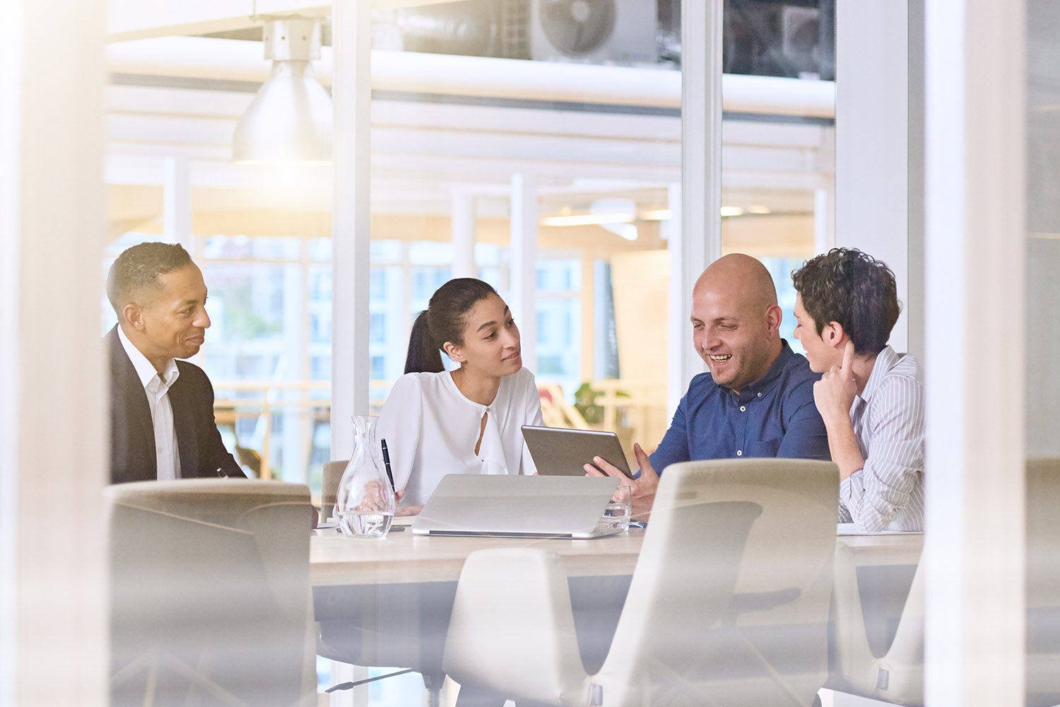 Learn for a lifetime - early morning sunrise business meeting in modern office conference room