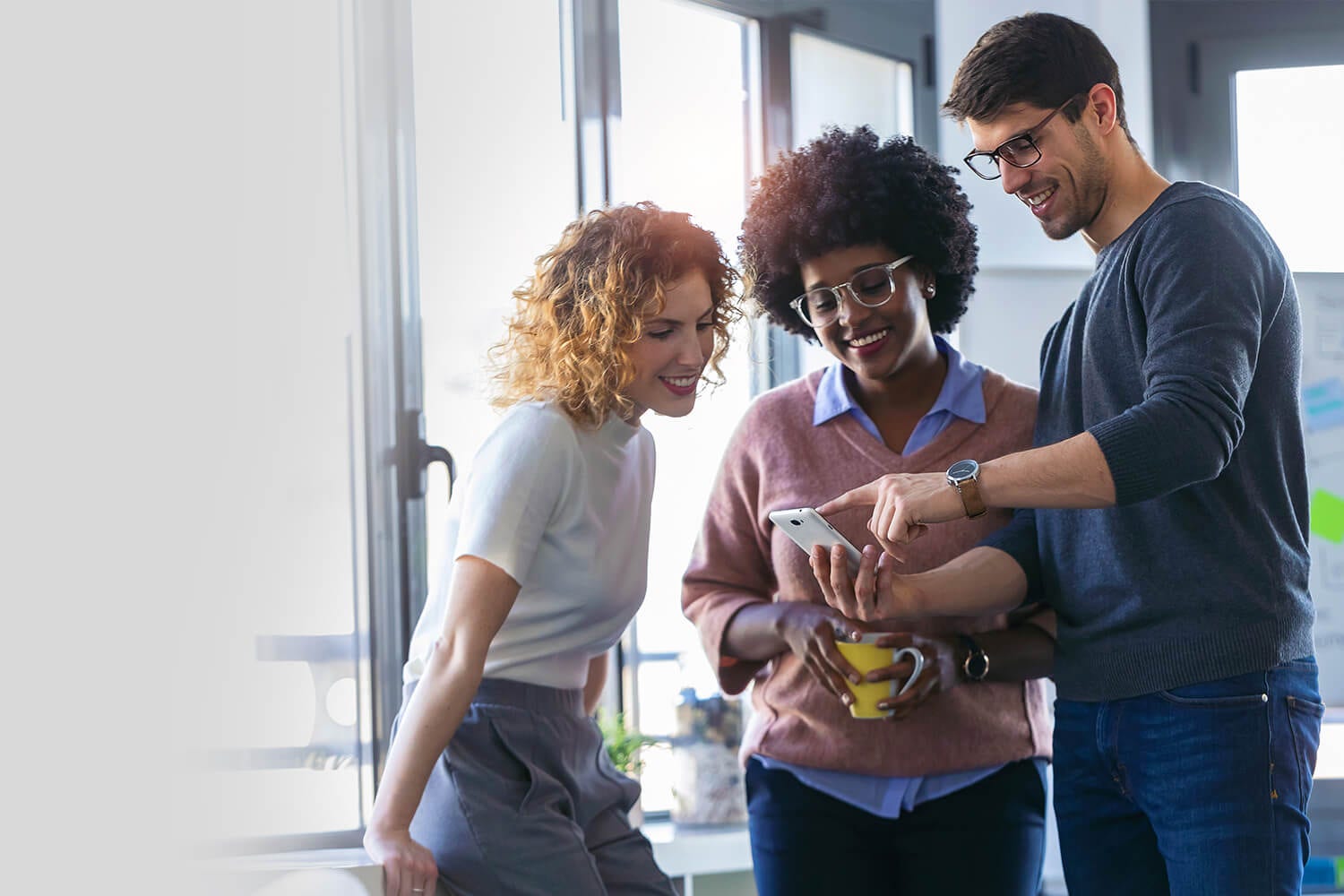 Colleagues checking phone