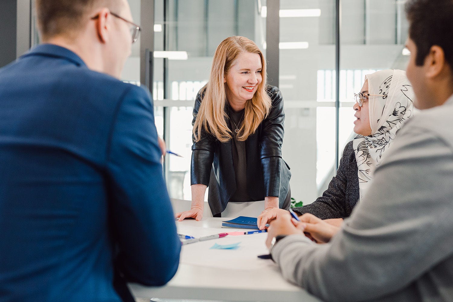 Three KPMG employees in meeting