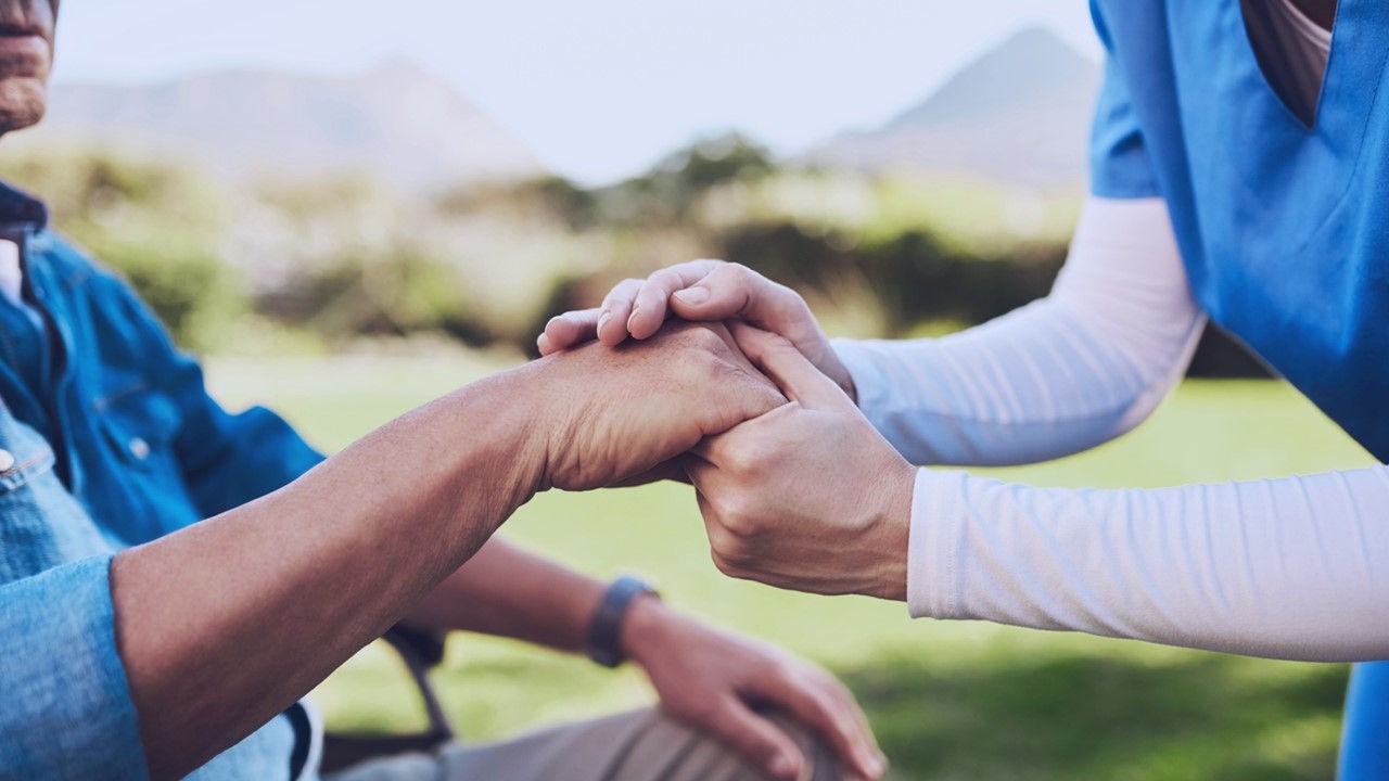 Health care worker with patient.