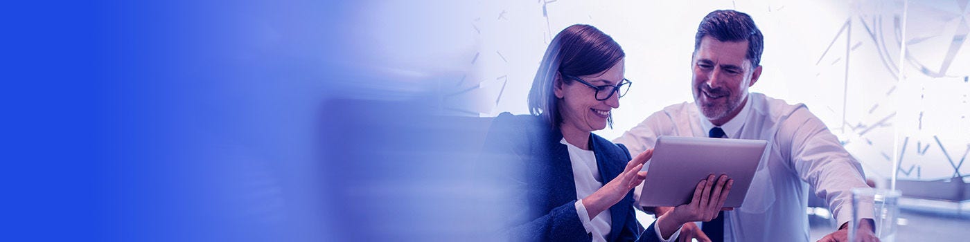 man and woman in meeting