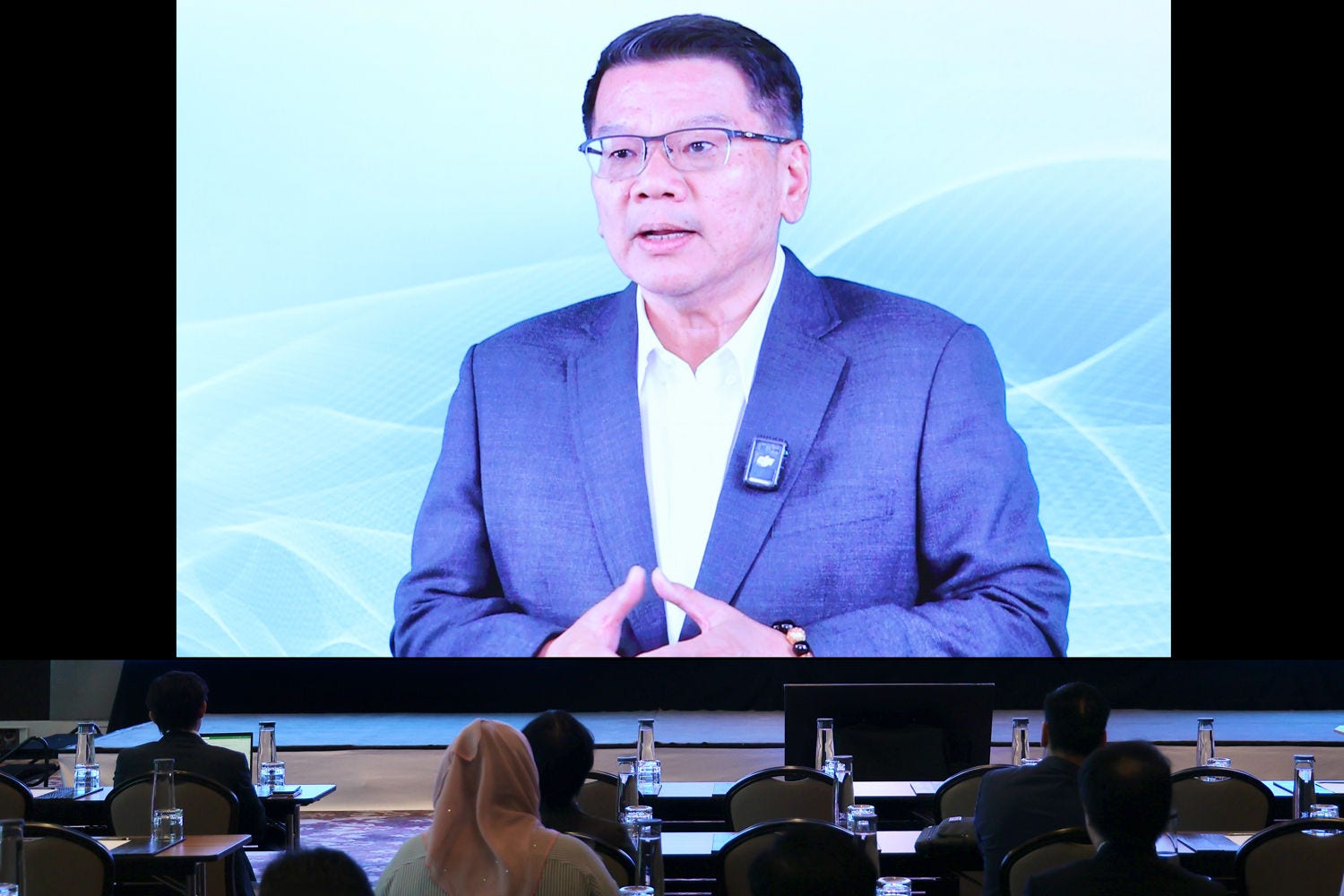 Charoen Phosamritlert, Chief Executive Officer, KPMG in Thailand, Myanmar and Laos, on screen