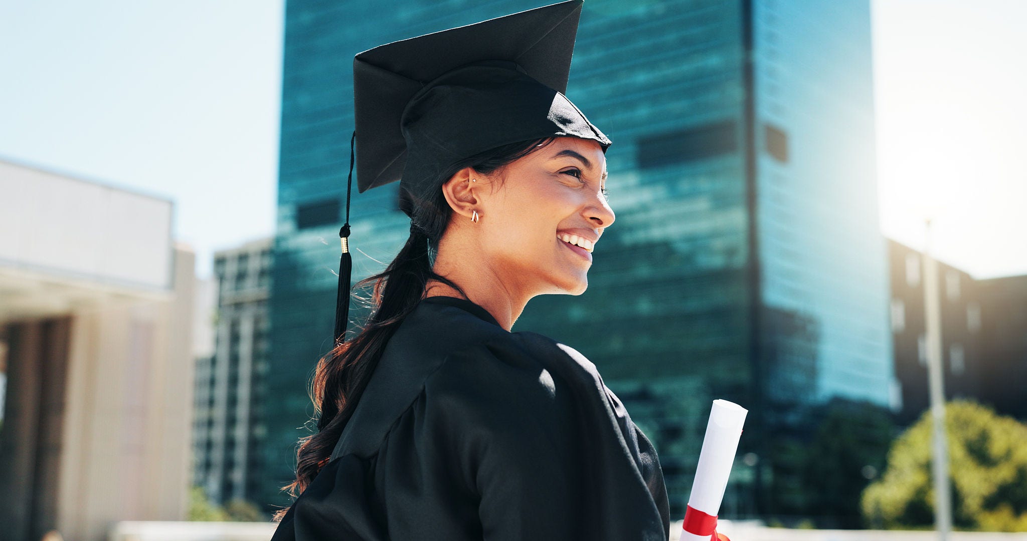City, graduation and thinking with woman student outdoor for celebration or education event. Certificate, future and scholarship with smile of college or university graduate downtown for milestone.