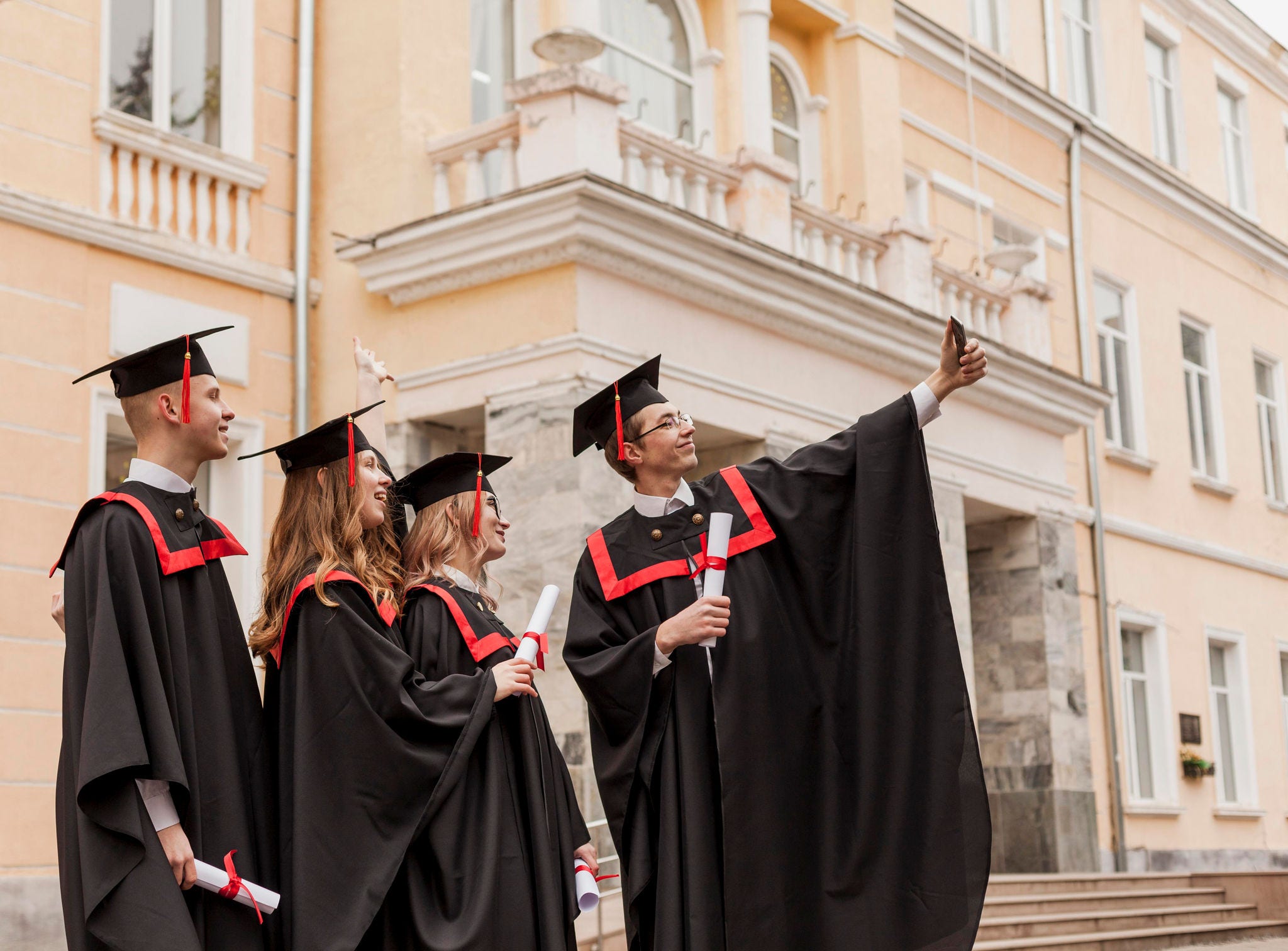 graduates taking a selfie 
