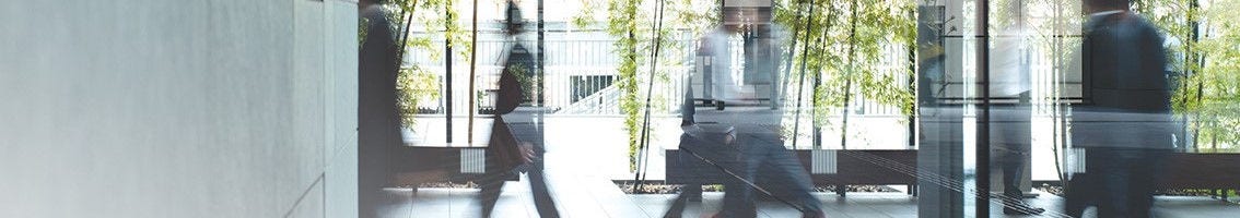 business-people-walking-in-a-building