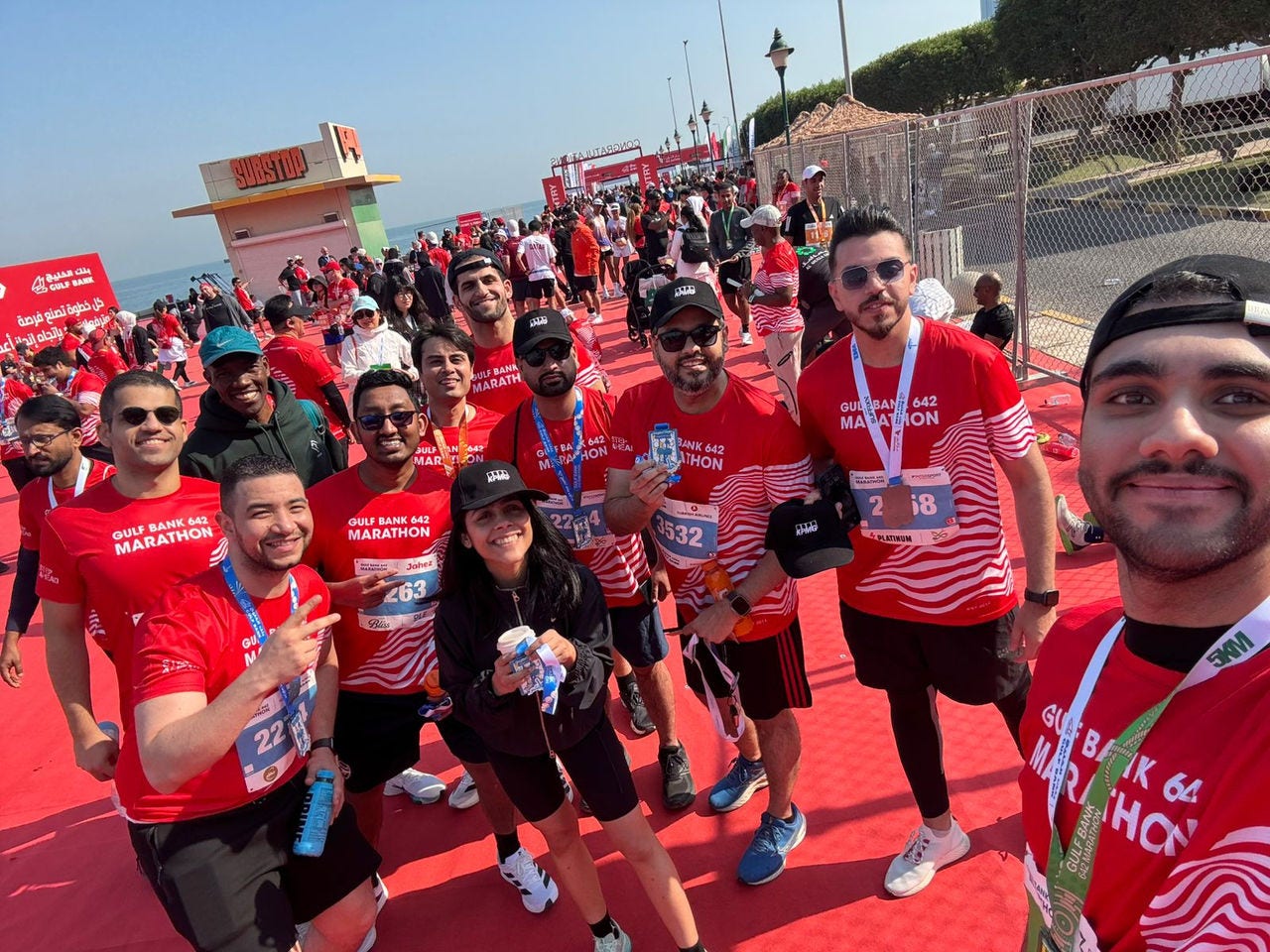 Group photo of some KPMG employees who participated in the Gulf Bank Marathon 2025