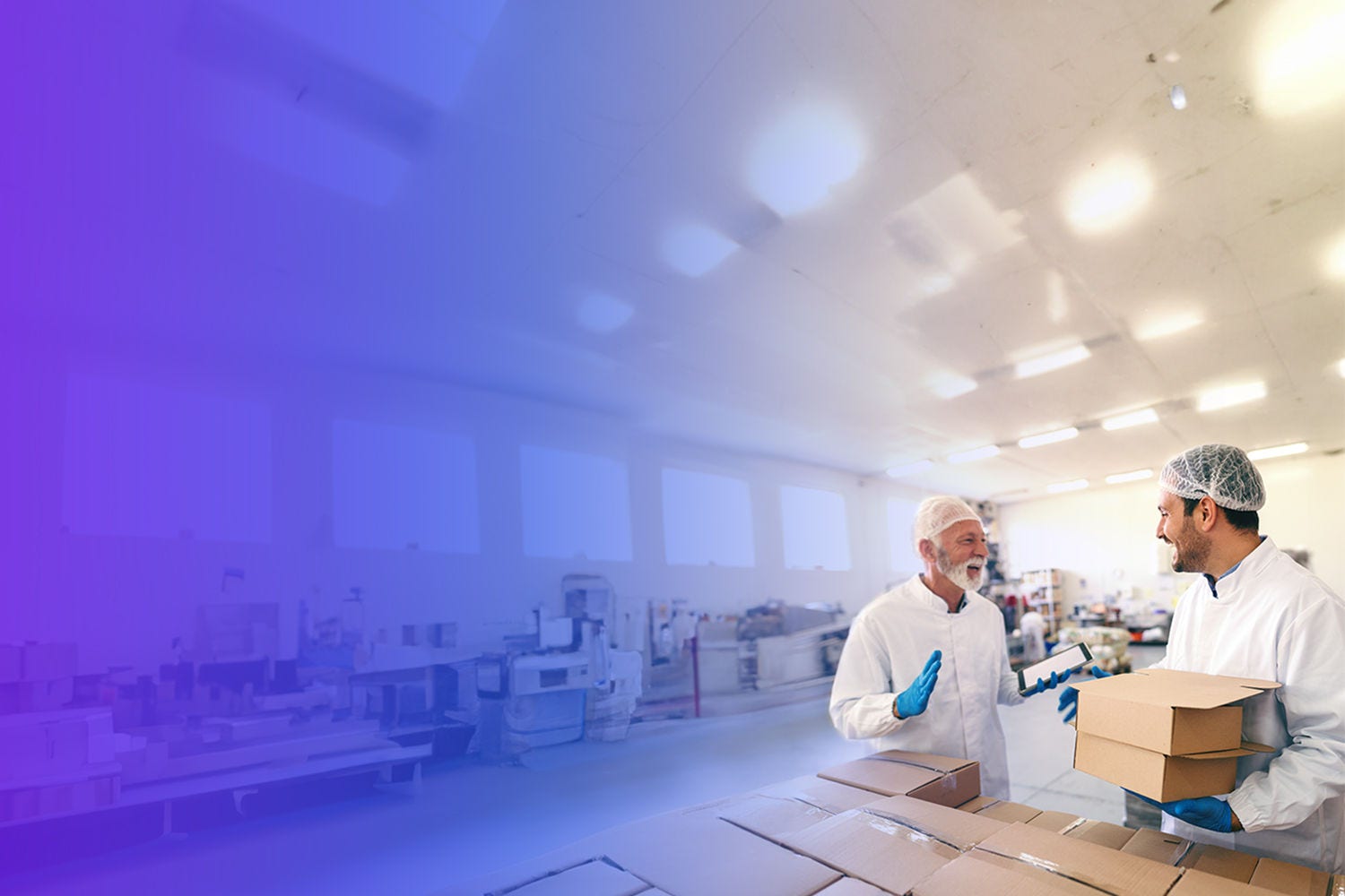 Two men in lab laughing