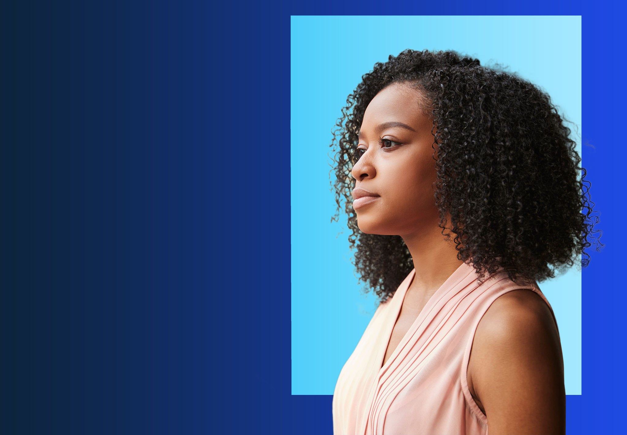 Outdoor shot of young woman using mobile phone outdoors in the city. Female business professional using smart phone in the city.