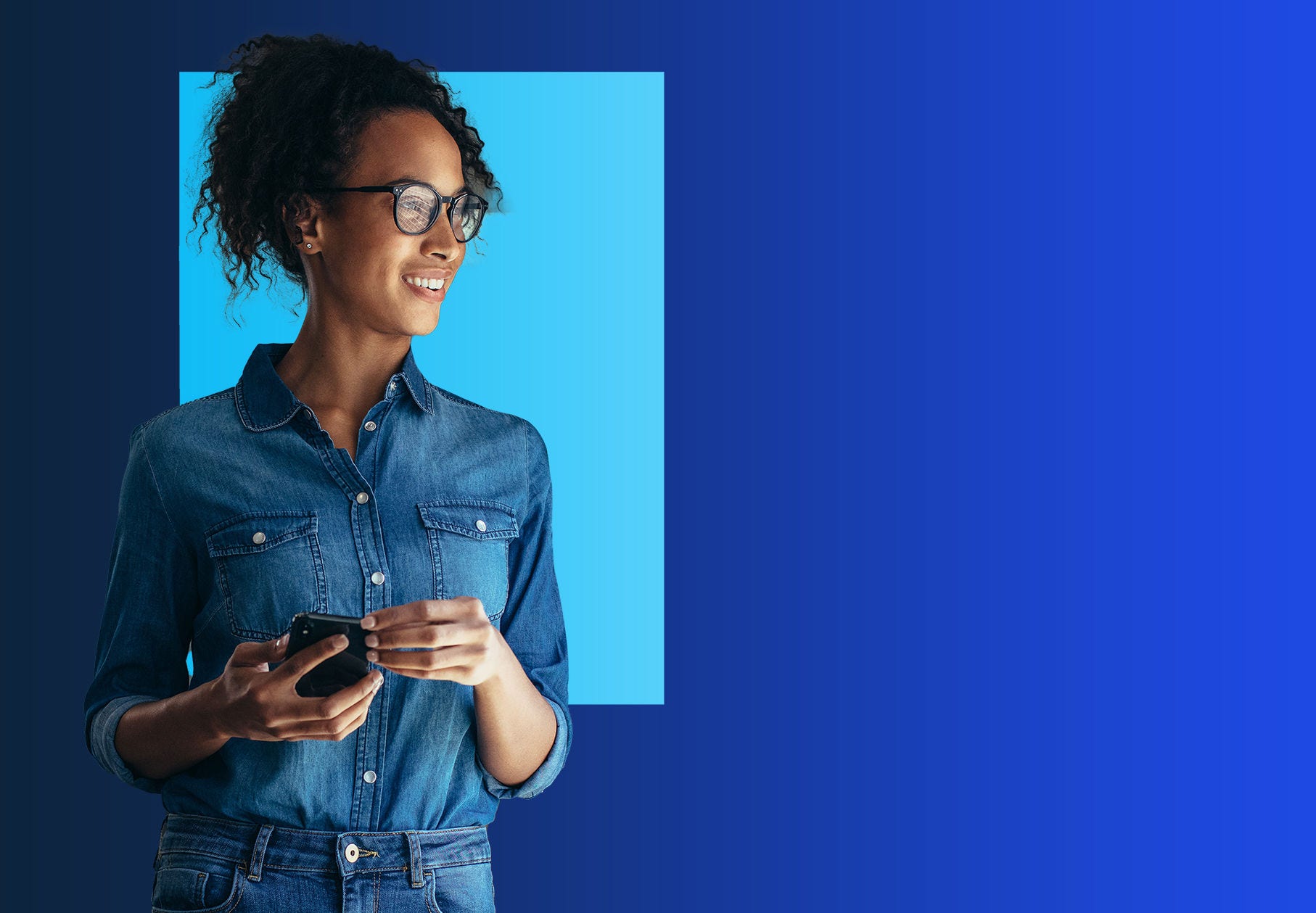Outdoor shot of young woman using mobile phone outdoors in the city
