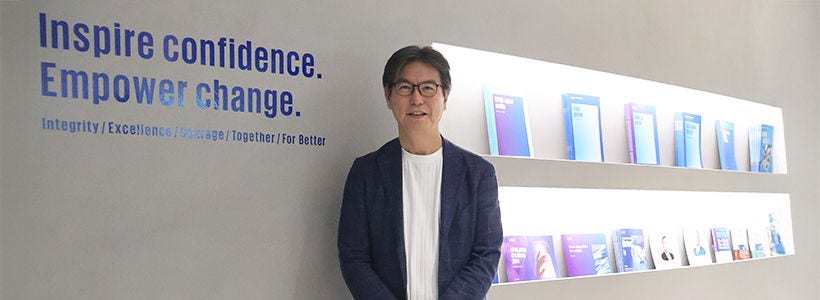 Japanese alt text: 製造セクター統轄パートナー　坂本 正明