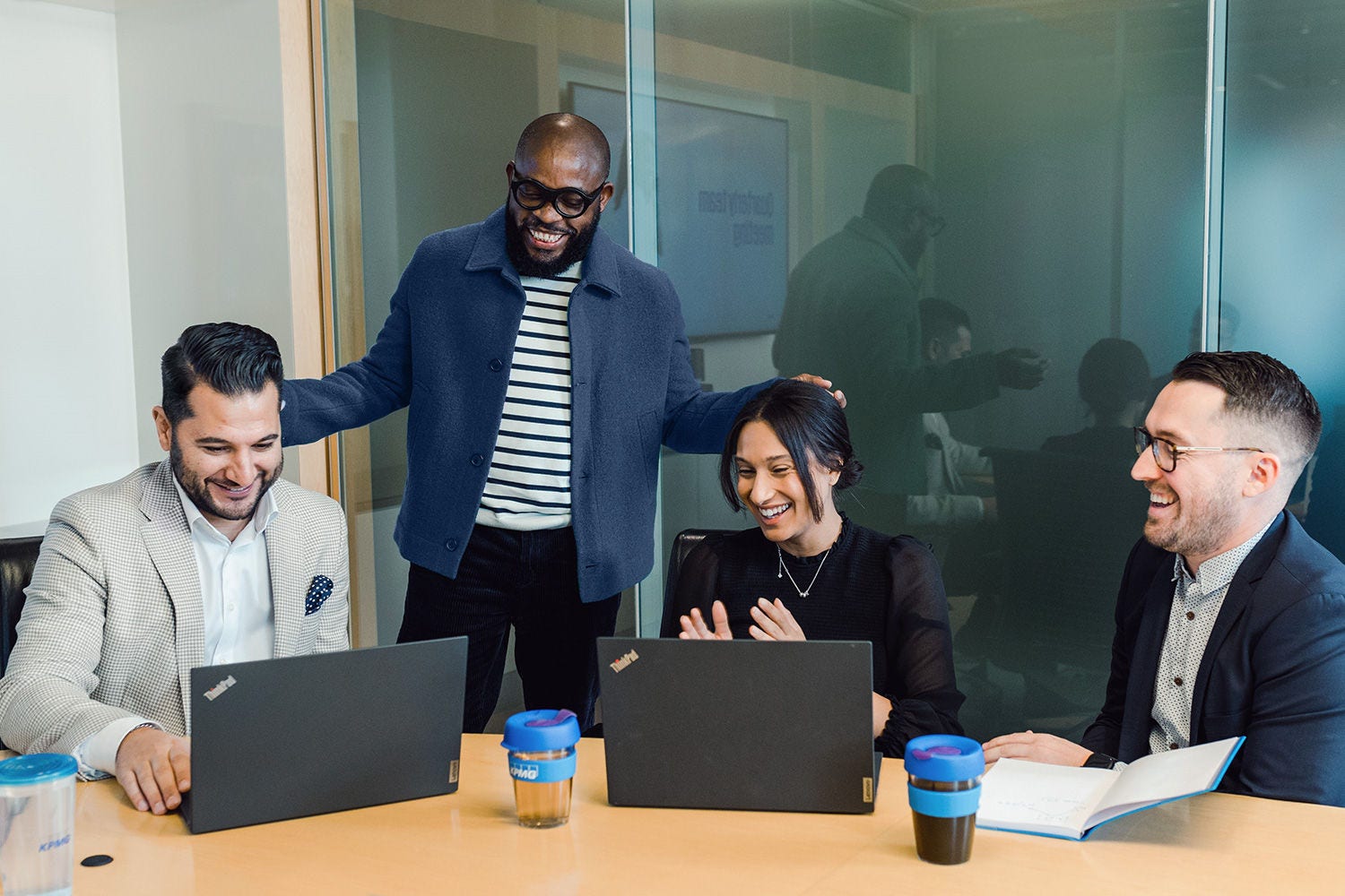 Coworkers meeting in boardroom