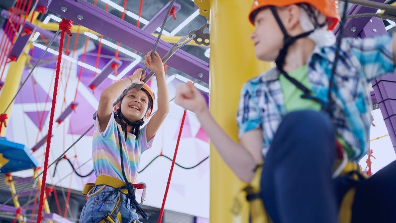 Children playing in a recreation centre.