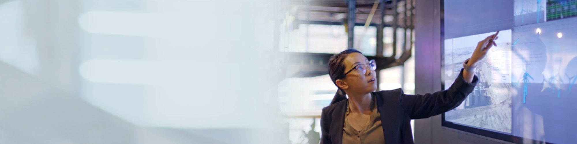 Woman pointing on data screen