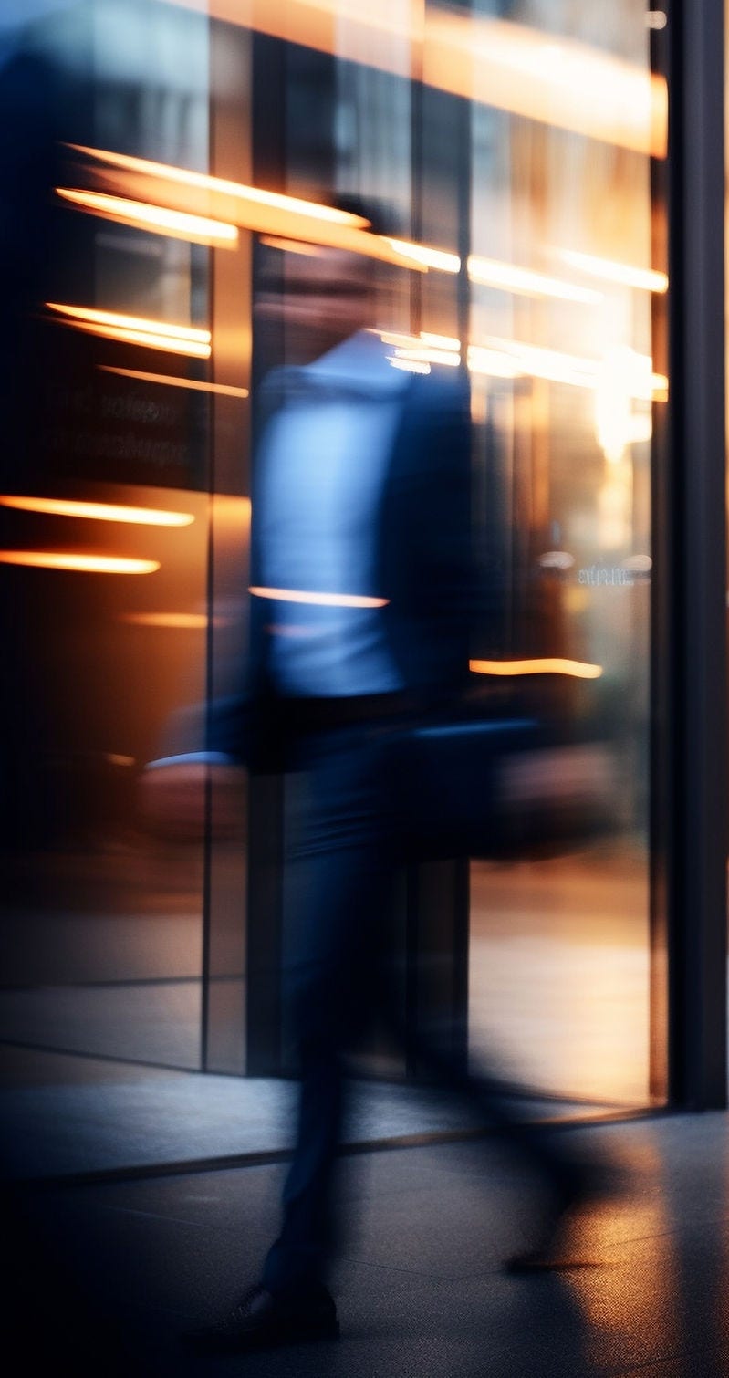 Modern blurred office with motion blur business people working.