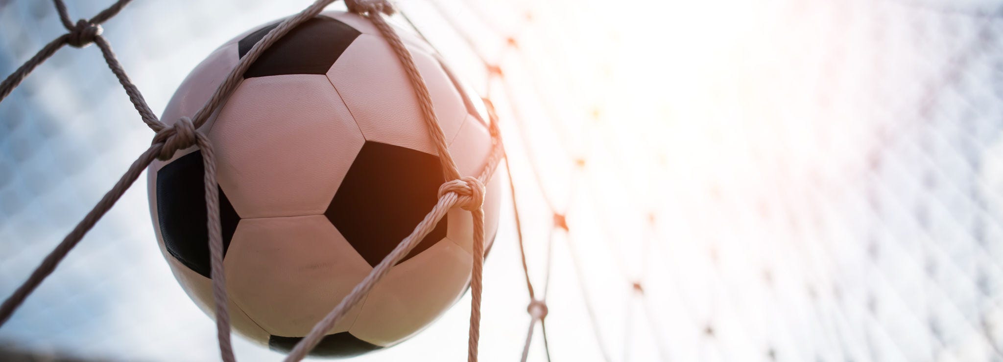 Soccer into goal success concept