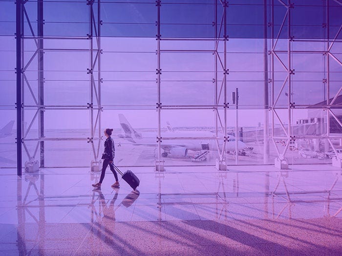 Woman walking at airport Woman walking at airport