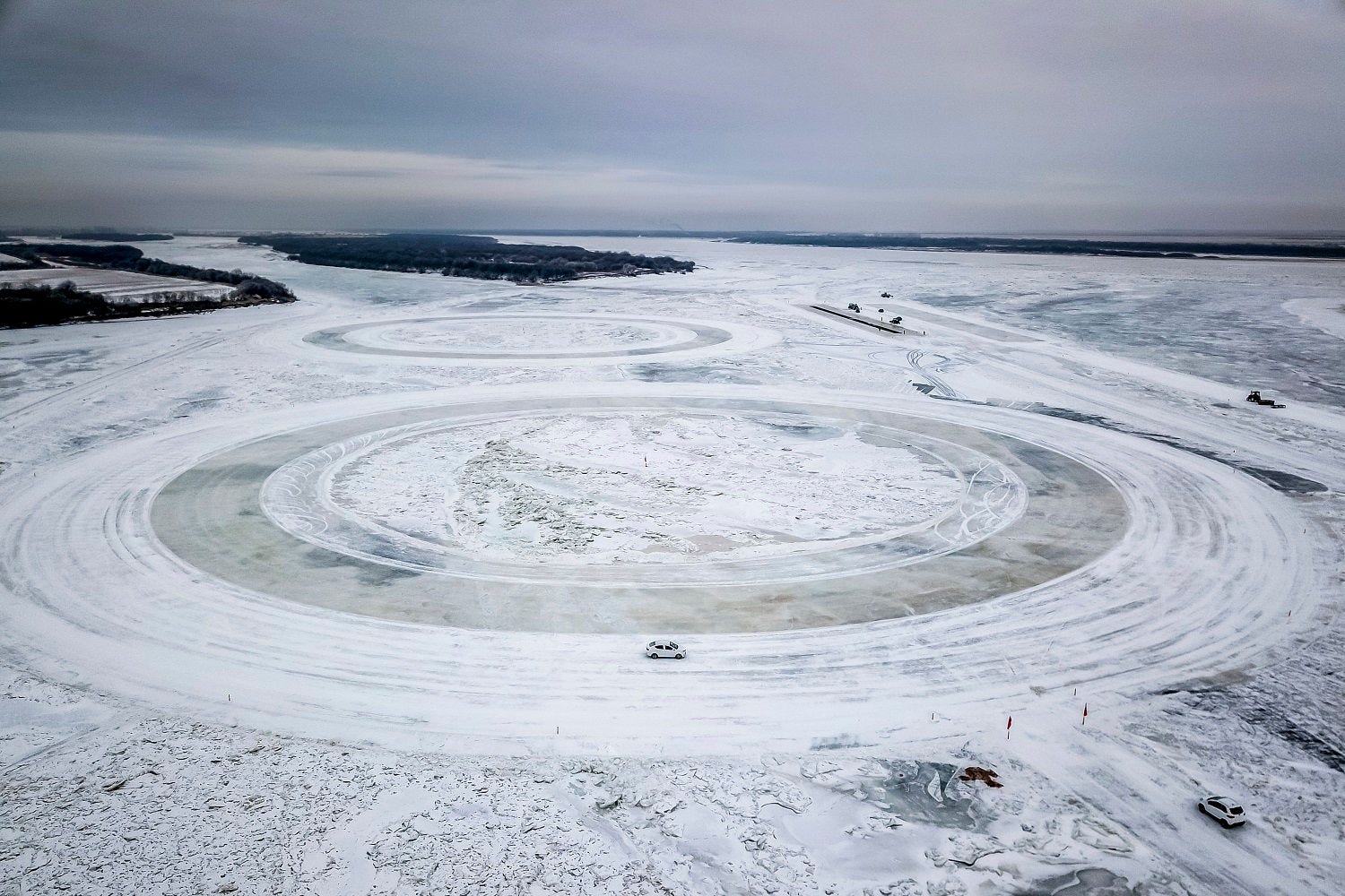 Aerial view of cars on circular roads in glacier