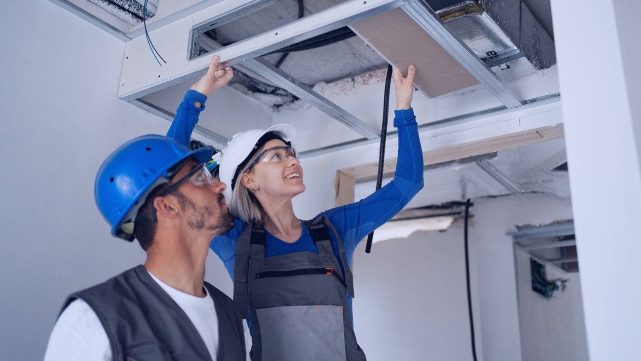 Persons conducting repairs.