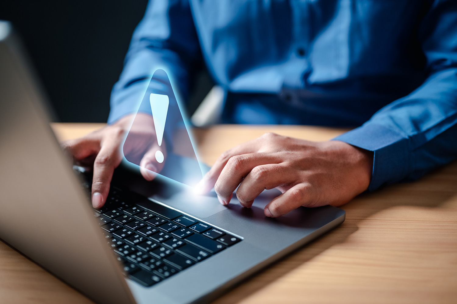 man working on laptop