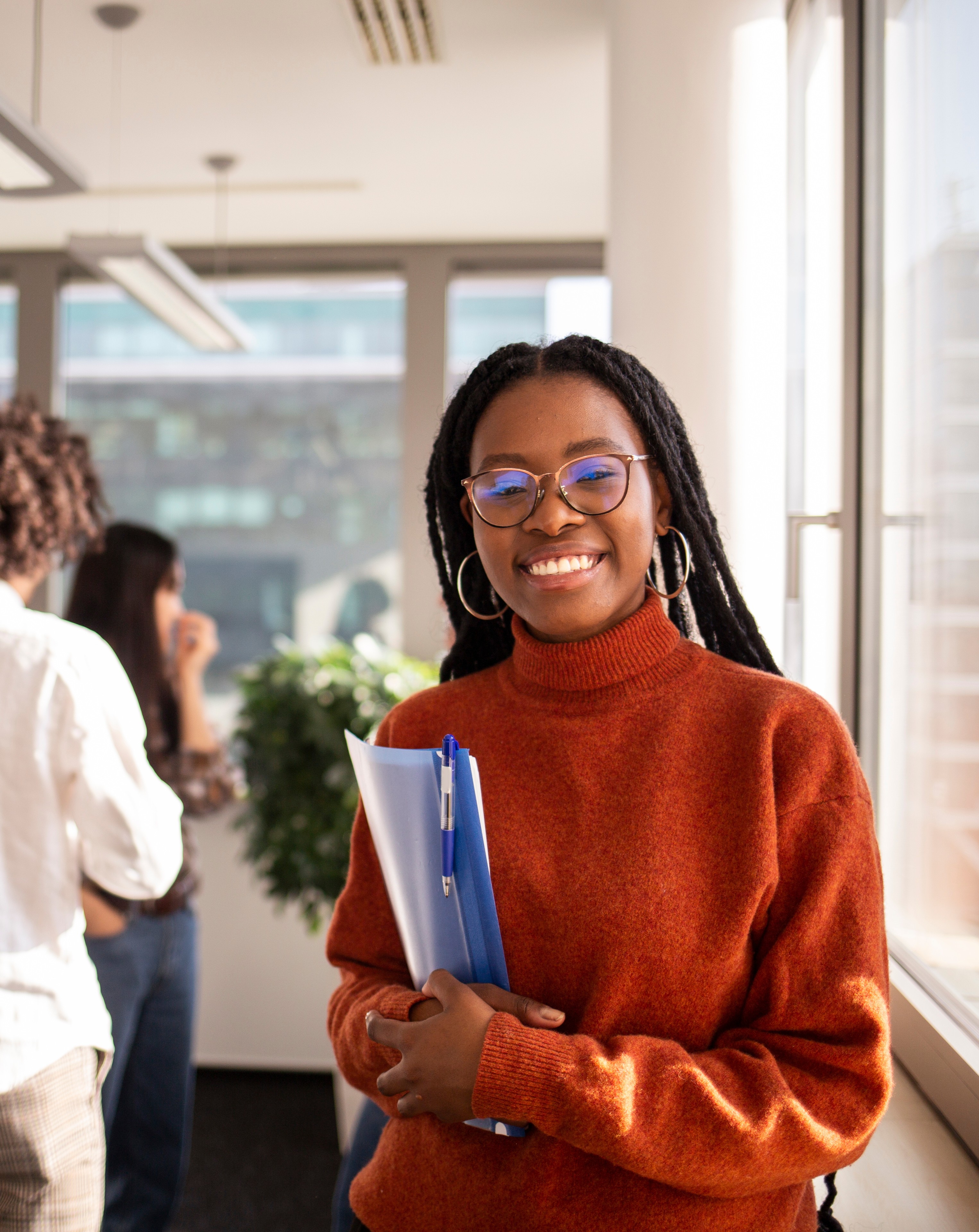 Young female professional smiling at camera