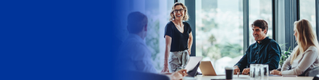Woman standing in a meeting