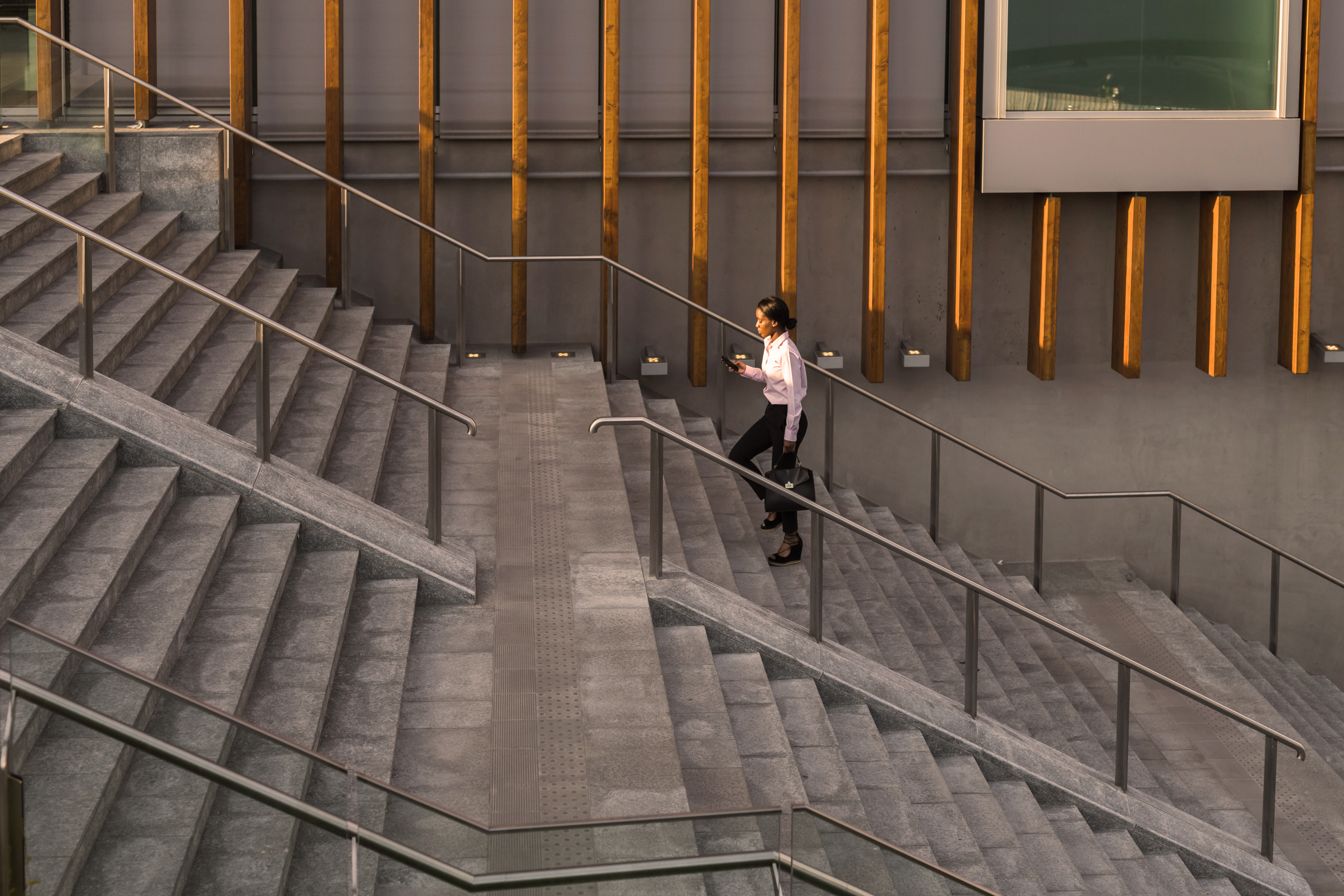woman walking up a staircase
