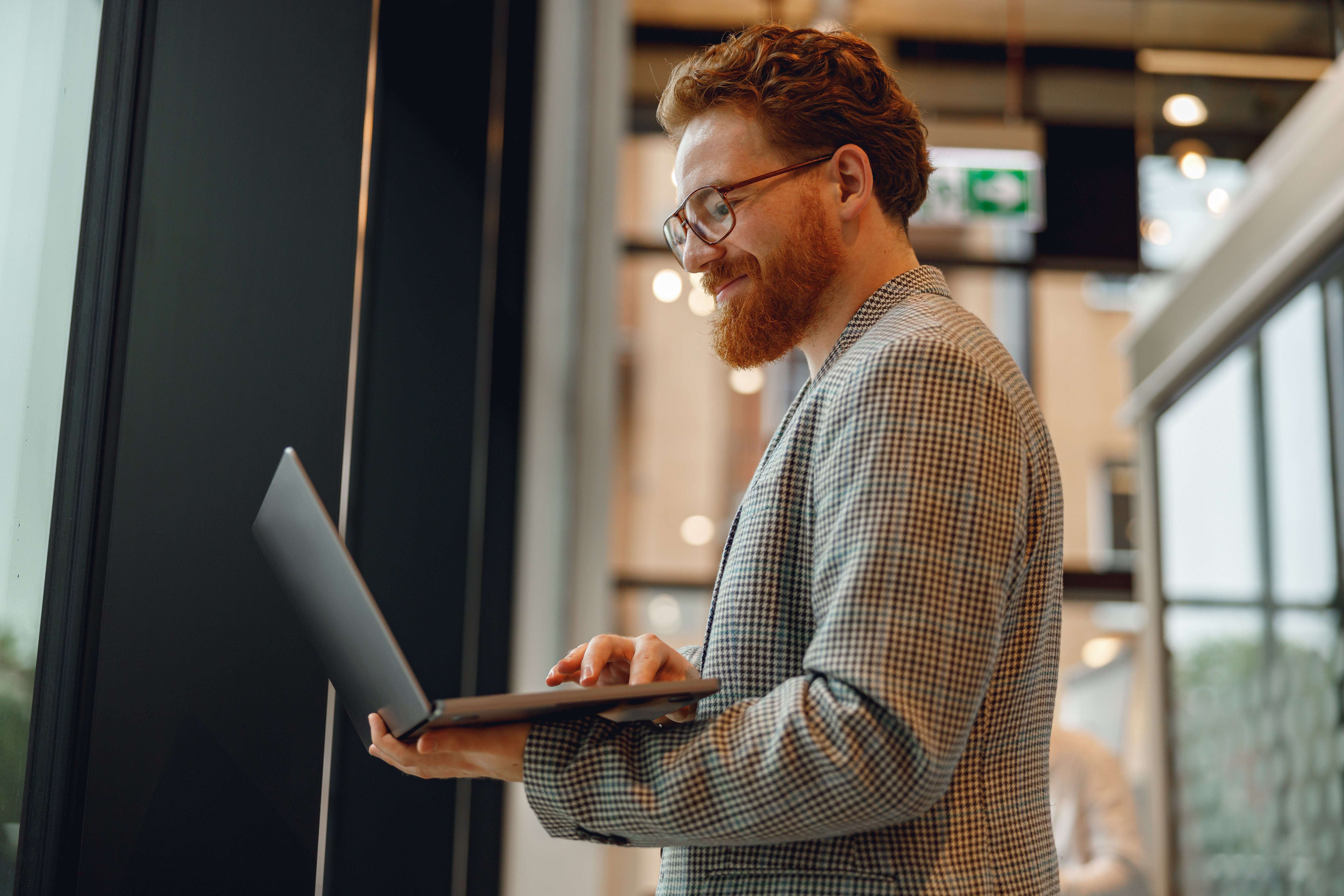 man looking at laptop
